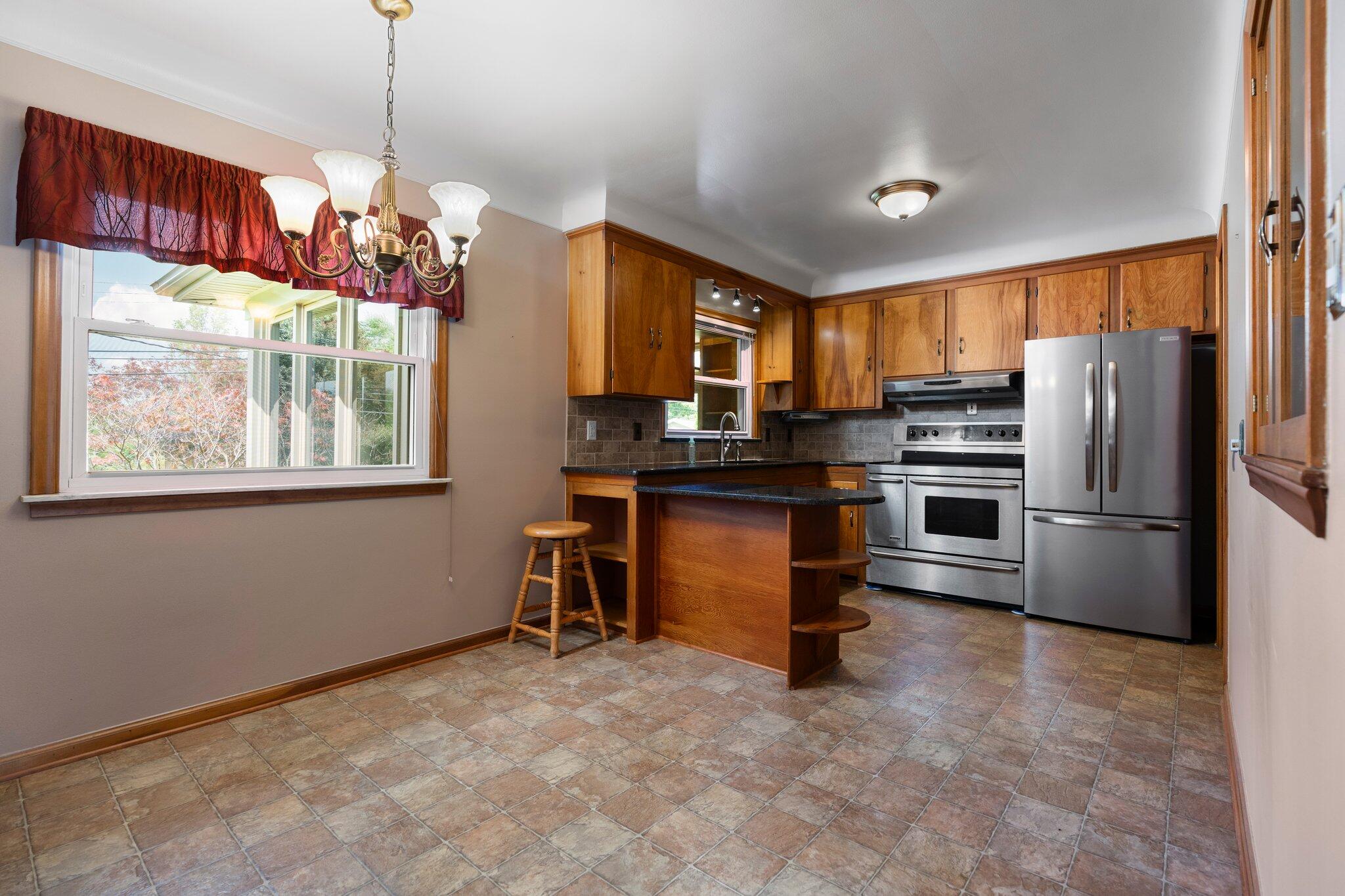 Photo 6 of 39 of 15940 Goddard Road house