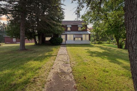 A home in Comins Twp