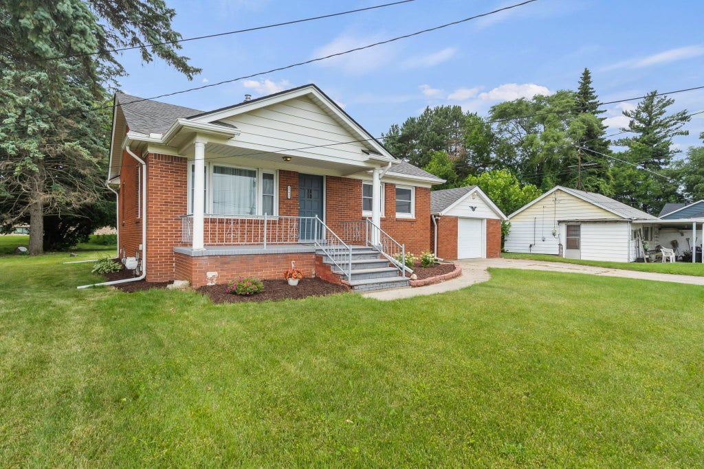 Photo of 48435 ROMEO PLANK Road, Macomb Township, MI 48044 (MLS # 20240044164)