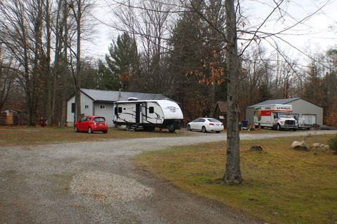 A home in Maple Forest Twp