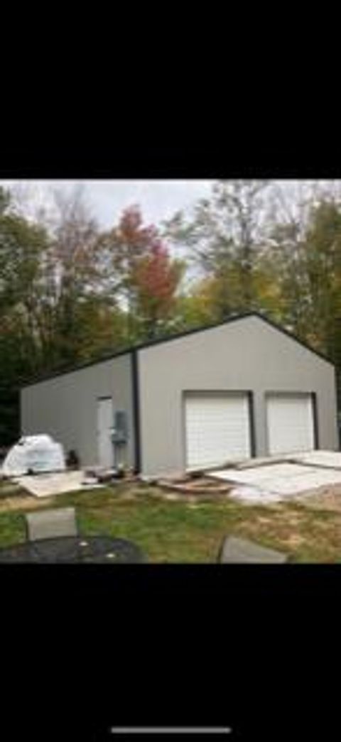 A home in Maple Forest Twp