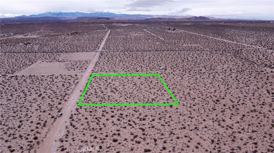 Break ground and build your dream home or homes on these flat lots! Let your creativity take front and take advantage of this desirable lot. This lot is just over 2 acres and is located in the secluded area of Joshua Tree but is still only 20 minutes from the park. Peaceful and quiet with expansive views for miles. Utilities are close by. Electricity is on Border avenue. Water connection is about 1,200 feet away