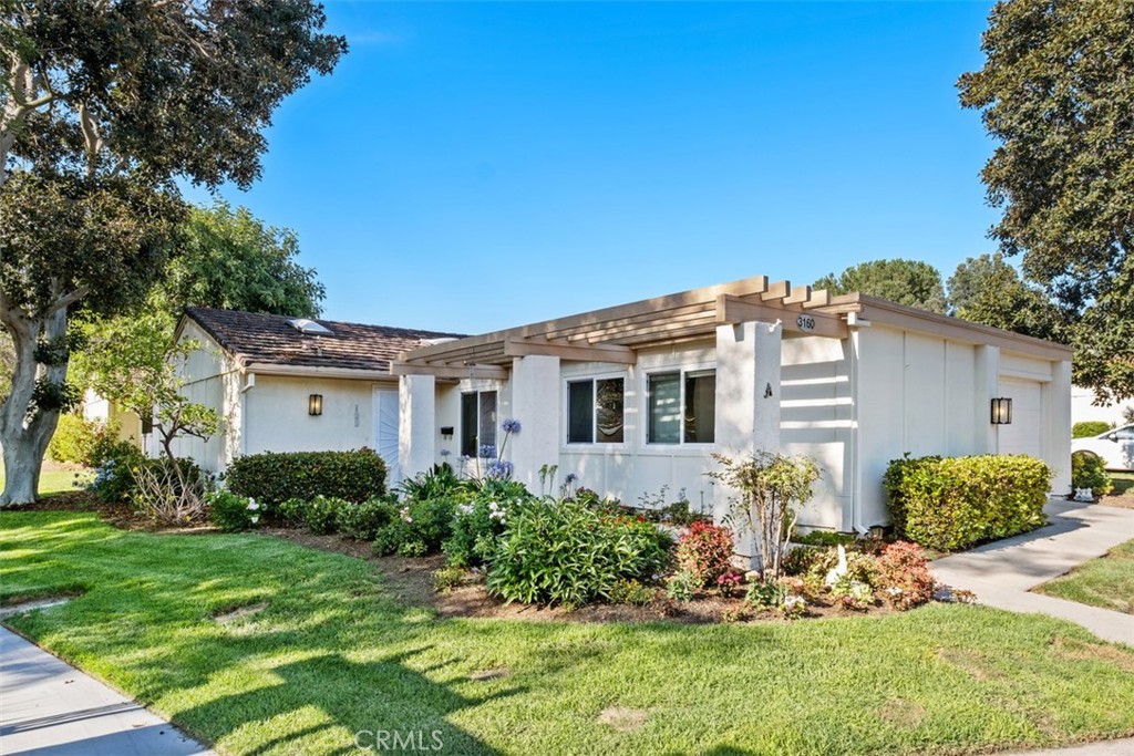 BACK ON THE MARKET... Welcome to this spacious corner home in the heart of the senior community of Laguna Woods Village close to gate 7. Single level with an attached one-car garage off the kitchen with lots of storage and side-by-side Washer & Dryer. GREAT and convenient location with a nice curb appeal and a beautiful front yard. This popular model "EL DOBLE" has two dual master suites with a tremendous amount of living space with an added office space with a built-in wall unit that could also be used as a 3rd bedroom, along with a formal dining room, or can be used for a multipurpose room...this home has a lot of space perfect for entertaining guests. The guest bedroom has custom built-in cabinets and both bedrooms have plantation shutters and closet organizers. Upgrades include Central Heat and Air Conditioning, Smooth Ceilings, Tile Floors throughout, except Laminate Wood Floors in both bedrooms, Upgraded Kitchen with a good size pantry w/pull-outs, Ceiling Fan, and Skylight. In Addition, Smooth Ceilings, a Large Skylight in the Living Room, Skylights in both bedrooms, Newer Double-Pane Windows, Freshly Painted throughout, along with the Security Gate and Front Door freshly painted, Custom Baseboards, Crown Molding, 4 ceiling fans in both bedrooms, Living room, and ceiling fan in the office...MUST SEE : ) This home is wonderfully situated with natural light and openness. A New Water Heater is being installed. Add all this to the amenities offered by Laguna Woods Village and you have a winning combination -- 27 hole championship golf course or the 9-hole executive par 3 course, tennis, paddle tennis, pickleball, lawn bowling, 2 fitness centers, 7 clubhouses, 5 swimming pools, equestrian center, gardening opportunities, art studio, world-class wood shop, over 200 clubs and organizations ensure you will never get bored here! Plus, free bus transportation around the community and nearby shopping and bus trips. Also, there is a very economical RV storage area to park your RV. Country Club Living at its BEST and just approximately 6 miles from beautiful Laguna Beach!
