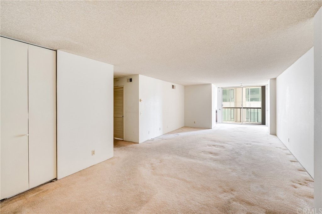 Charming condominium in Wilshire Selby Towers East. Located on Wilshire Blvd in between Selby Ave. and Manning Ave. This condo is great a great find! Condo needs updating but is clean, functional, and ready for a new owner. 1 bedroom, 2 bath full baths, and 900 sqft inside. Entry opens to full guest bath on the left with large vanity and separate shower. Living room also extends from front entry and is quite spacious with closet space and outdoor patio. To the left of patio is the kitchen with retro cabinets, tile-counter tops, and fridge (included). Primary bedroom is roomy with good closet space, separate vanity with sink, and partial view of Hollywood Hills. Full bath w/ shower and bath tub sits across from vanity. Condo includes one parking space storage areas in gated garage. 24-hour doorman. Community pool. Once again, this condo needs updating but is a great find with wonderful potential!