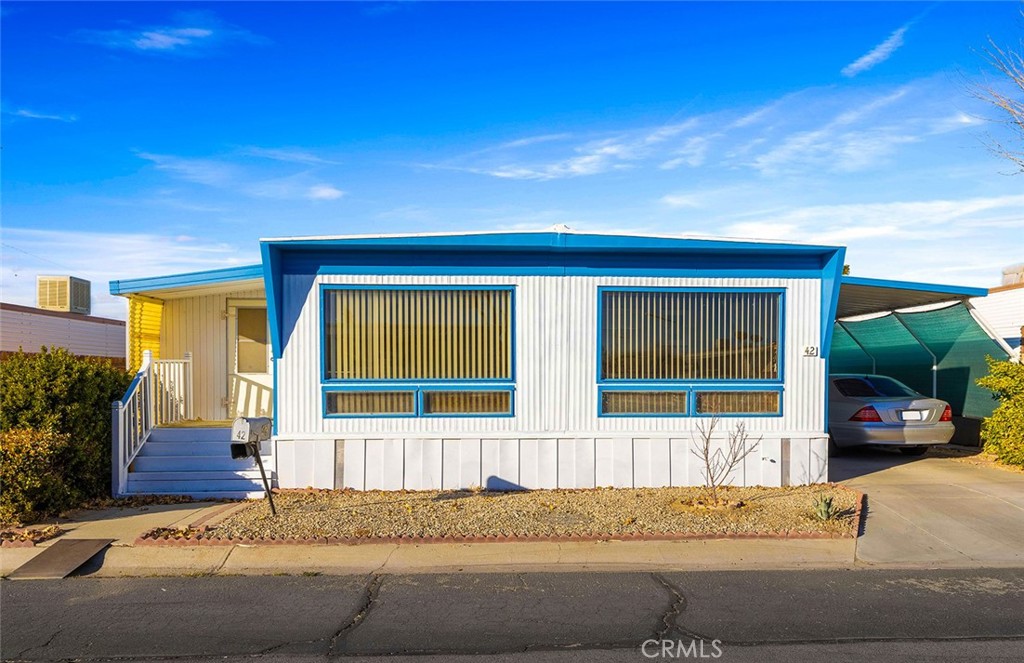 Move in Ready! Own a beautifully remodeled and renovated Mobile Home in this quiet 55+ community in the high desert of Lancaster! Located in a serene 55+ gated community , this home has been completely renovated with all-new features, including fresh paint, updated plumbing, remodeled bathrooms, freshly painted exteriors, new ceiling, new water heater, new garbage disposal and a brand new roof. Inside, you will find a spacious master bedroom with ample closet spaced a spacious living room offering a relaxing retreat. Whether you are looking for a peaceful place to call home or an easy maintenance option, this home has it all. Plus an enclosed patio which offers additional storage or a bonus room. The community offers a pool, a billiard room, and conference area where neighbors get together to enjoy coffee and conversation! Don't miss out on this stunning, move-in ready opportunity in one of the area's loveliest retiree communities. OWNER MOTIVATED!