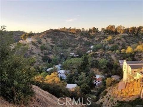 Photo of 2537 Woodstock Road, Los Angeles, CA 90046 (MLS # SB25063986)
