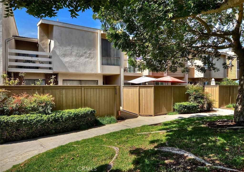 Don't miss this 3 bedroom 2.5 bath condo in desirable Brookview community. Home offers remodeled kitchen with beautiful natural wood cabinetry, granite counters and includes stainless steel range, microwave and refrigerator plus reverse osmosis in kitchen. Spacious patio off formal dining offers plenty of room to entertain. All bathrooms (3) have upgraded stone countertops & tile floors; upstairs master bedroom is oversized with beautifully remodeled master shower and offers slider to private balcony to enjoy a cup of coffee or drinks; inside laundry room plus direct access into attached 2 car garage with lots of storage space. Central A/C too! Brookview offers 2 pools, 2 tennis courts & tot lot. This property is priced to sell quickly!