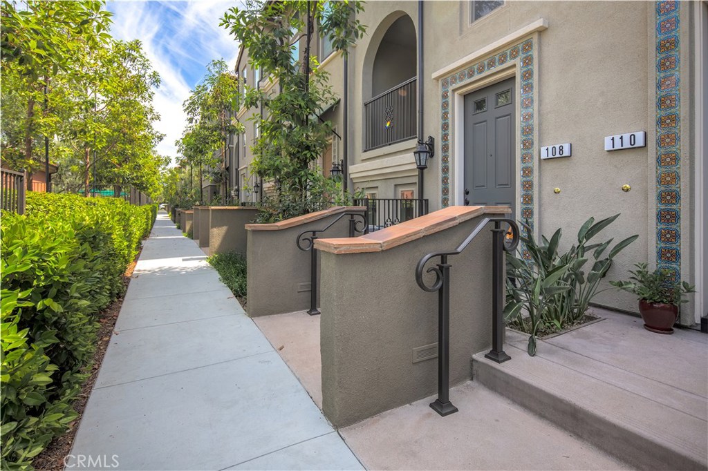 Welcome to this 3 story condo in the Portola Springs community. This home features 2 master bedroom and 2.5 bathroom with attached garage . The main rooms upstairs. Dinning area that seamlessly connect to the Gourmet Kitchen featuring stainless-steel built in appliances, slab granite counter tops, a large island with Eating Bar.Covered patio is connected to the living room is ideal for BBQ and outdoor lounging.Laundry area is inside the unit and includes washer and dryer. It's ideal location within the community ,only step to playground ,short walk to the community pools, clubhouse, spa, tennis, and parks.Perfect location close to shopping center. Portola Springs is part of the prestigious Irvine Unified school district and specifically, the state-of-the-art Portola High School.Move-in ready and ready to make it home today!