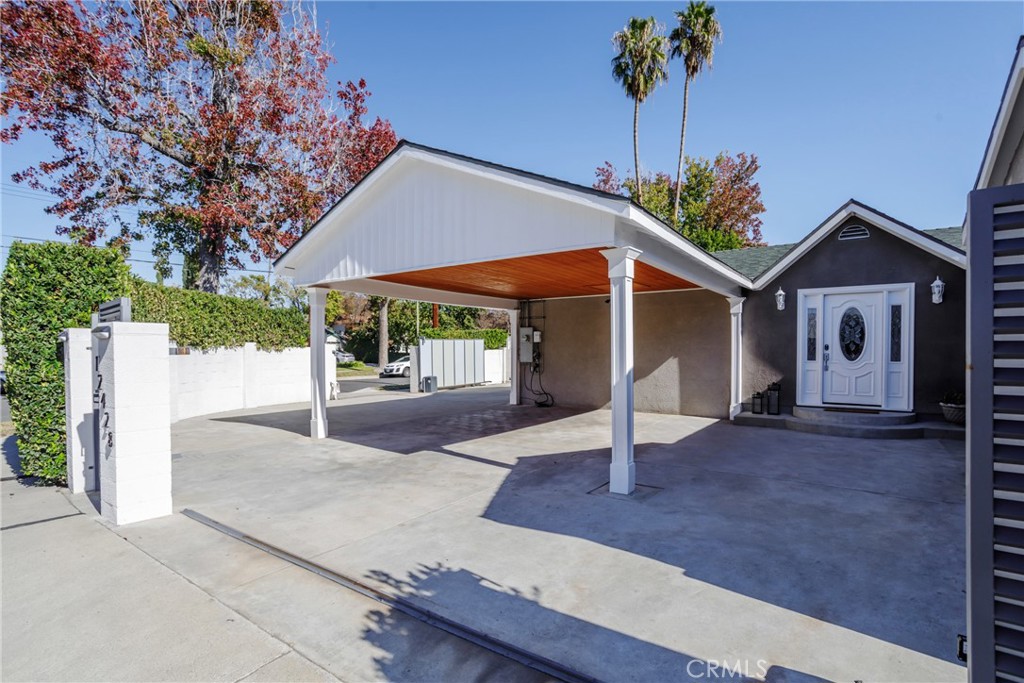 For Lease and Fully Furnished with EV Charger! Newly remodeled and spacious, this stunning home in North Hollywood offers the perfect blend of comfort and convenience. With two gated entrances for added privacy and ample parking, the property is centrally located near major freeways and attractions in a peaceful, quiet neighborhood. The home features a beautifully covered backyard, ideal for entertaining, complete with a hot tub and an outdoor entertainment area. Inside and out, you'll find modern touches, including indoor and outdoor dining spaces. This 5-bedroom, 5-bathroom gem in the Valley Village/North Hollywood area is thoughtfully designed to ensure comfort for groups of all sizes. Whether you're planning a short stay or an extended visit to Los Angeles, this unique and stylish property is the perfect retreat.
