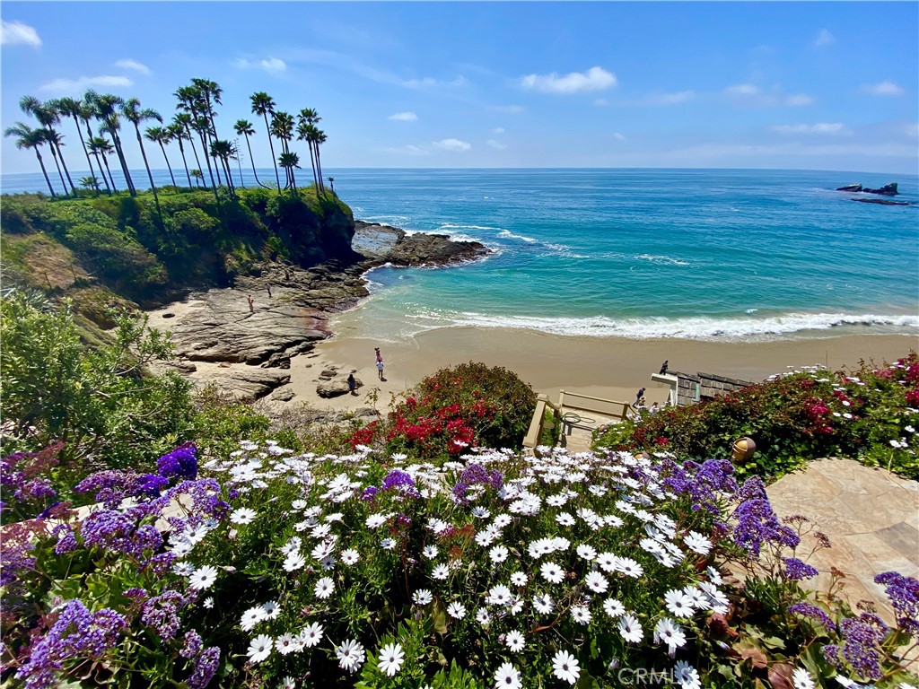Turn-Key! Spectacular Ocean Front home overlooking Crescent Bay Beach. This "Direct Beach Access" property is situated in one of North Laguna's most coveted locations. Spacious Living Room with fireplace features walls of glass overlooking panoramic coastline views. Step out to an expansive patio/yard area with an oversize (in-ground) jacuzzi spa with breathtaking views. The BBQ area with alfresco dining (table seating six and outdoor "living room") is perfect for entertaining, complete with Firepit (with built-in seating) overlooking the crashing waves below. A private bluff-top cabana/beach cottage with a cozy fireplace makes an inspiring retreat. A great room with a wall of windows that pocket in on either side overlooks panoramic views of Crescent Bay. The gourmet kitchen with high-end appliances and central island is open-concept, allowing for mingling and dining with a backdrop of Catalina Island ocean views. Five large Bedrooms include an Ocean Front Master Suite with a wall of windows leading to heated decks. The spacious Master Spa/bathroom features an oversize jetted tub and a large steam shower. A separate (completely equipped) office, also with ocean views, makes working feel like a part of your vacation. Stroll along coastal bluffs (Heisler Park) to downtown shopping galleries and dining, or step down to the pristine cove beach. This turn-key rental is fully equipped for your perfect dream home away from home! Variable rate depending on term and season.