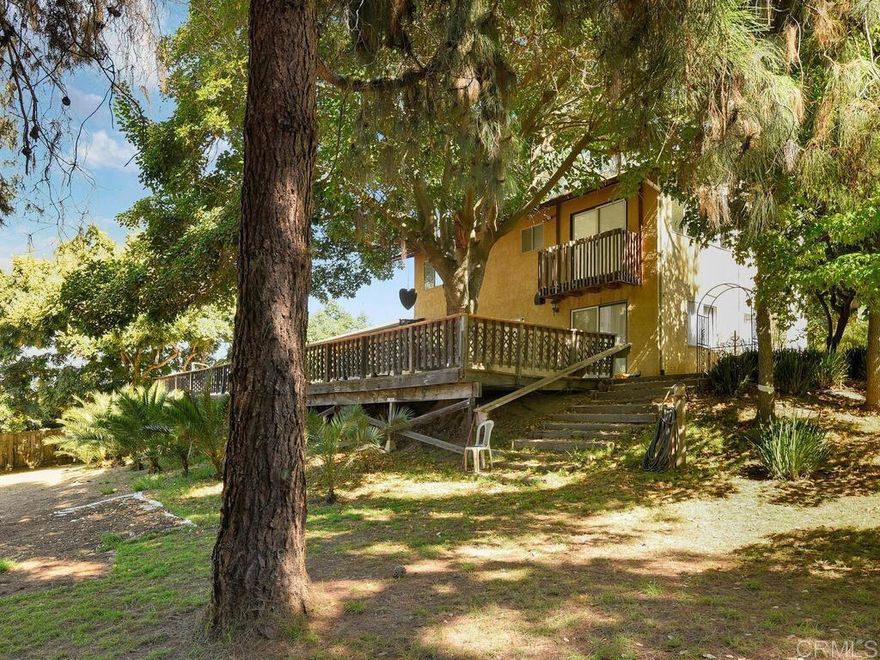 Great home minutes from Fallbrook Village but feels like you're in the quiet country.  Large usable 1.12-acre land with a HUGE shop and lots of room to build a ADU put in a pool or just enjoy the land. The two story 4-bedroom/3-bathroom home has new paint and flooring throughout and is at the end of private road.  The large deck overlooking the property is so peaceful and welcoming.  Make this amazing property HOME SWEET HOME!