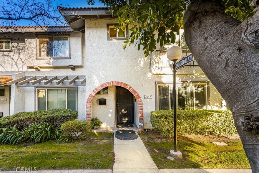 Welcome to the serene community of Villa De Amo. This charming two-story townhome offers the perfect blend of comfort and convenience in a fantastic location. The main floor features a spacious living area seamlessly connected to the kitchen and dining area, providing a fluid layout that maximizes space and functionality. For added convenience, a half bath is located near the entryway. The kitchen is complemented by nice custom wood cabinets featuring convenient pull-out drawers and modern stainless steel appliances that will stay with the home. Stay hydrated with the added perk of an RO water filter system. The dining area opens to a roomy, airy patio perfect for gatherings. The garage offers direct access leading to both the patio and the main home, making unloading groceries a breeze. Other highlights include a new AC and water heater ensuring comfort year-round. On the second floor are all three spacious bedrooms. The HOA fee includes water and maintenance. The community offers a pool, spa, and a clubhouse equipped with a pool table for some fun and entertainment. It’s a nice quiet area. You can also watch a free Disneyland firework show right from your bedroom window! Lastly, this property qualifies for a $15,000 Grant, which can go towards closing cost or rate buy down. Schedule a showing today and start imagining the possibilities!