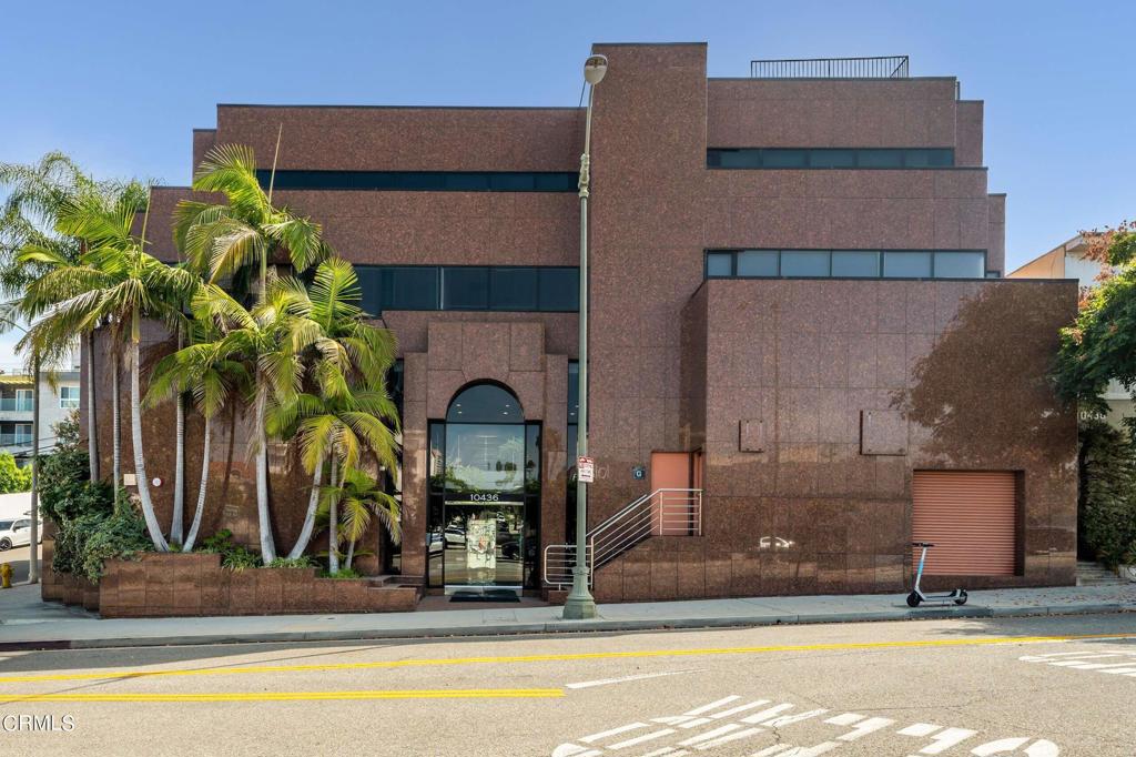 Century City Adjacent Owner-User Office Building.Totaling over 15,000 square feet, this gleaming, elegant four-story modern building gives you the option to occupy the 7,619 square foot fourth floor and rent the third level as passive income. Set on the corner of Santa Monica Boulevard and Holmby Avenue, it's moments from Santa Monica, Westwood, Beverly Hills and Century City. Built in 1991, the spacious 4th floor has been beautifully updated in rich natural stone, wood and glass, with lavish use of windows and skylights. The upper floor centers on an expansive executive suite with wraparound city views and private bathroom. The level, anchored by an airy private front receptionist area with client waiting area, also features eleven more private windowed offices, a large centralized work area with cubicles, a workroom, an updated kitchen, one large and one smaller conference room, and three more bathrooms.