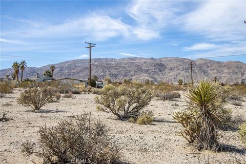 Photo of 7600 Bedouin Avenue, 29 Palms, CA 92277 (MLS # JT23040800)