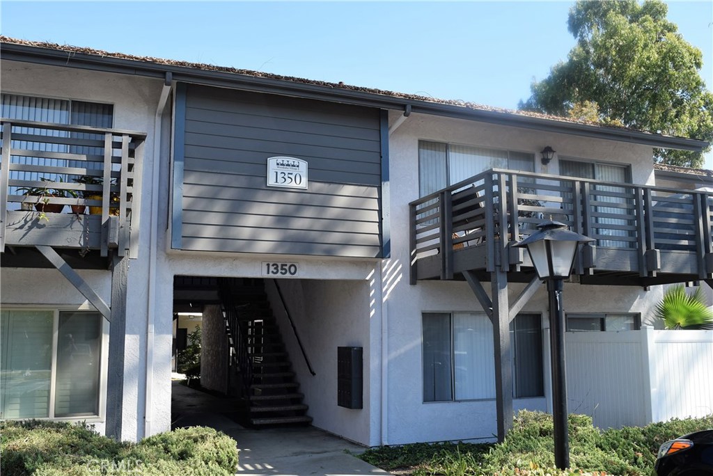 Woodlake Village condo for Sale. Nice location, downstairs unit with small private patio close to pool, laundry and greenbelt picnic area. Walk in to a spacious living room with wood laminate flooring. Kitchen has gas stove/oven, dishwasher and refrigerator. There is a dining area off kitchen with slider that leads to patio. Bathroom has separate vanity area apart from tub/shower. There is a large walk in closet before you enter the bedroom. Condo has 2" blinds, some tile, wood laminate and carpet for flooring, updated furnace, raised panel doors and no popcorn ceilings. Unit is located just outside a nice greenbelt area with picnic tables and BBQ's. Unit comes with assigned carport parking and 2 parking permits. Prime location away from street.