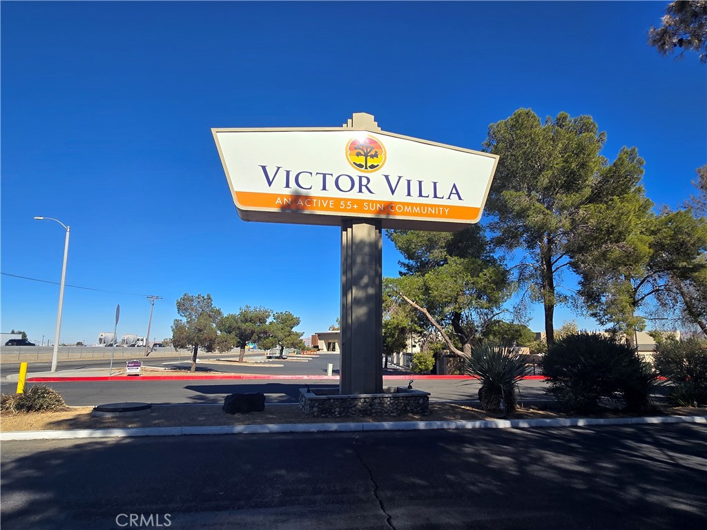 PRICE REDUCTION!
Your buyers will Love this Spacious 2/2 Manufactured Home with an XL Front Porch in a 55+ Community. Victor Villa is one of the High Desert's most desirable parks. Close to the freeway, shopping, "restaurant row", Victor Valley Mall, Movie Theater. This home features an Open Floor Plan with separate in-home Laundry Room and tons of storage. Outside you find its own off-street Covered parking for multiple vehicles as well as Two Storage Sheds and a cross fenced rear yard. This premier park is complete with features and amenities for the socially active residents. Sparkling Community pool, indoor spa, sauna and exercise room complete with gym equipment. There is a Tennis court, Shuffleboard, horseshoe pits and a putting green. Dog Run and Walking track. Also, there is a community game room with pool table and spacious club house for events and gatherings. Outdoor Cooking, poolside BBQ Facilities. The park features on-site office and community laundry room and custodial staff. Owner-Occupation only. Park Approval is required.