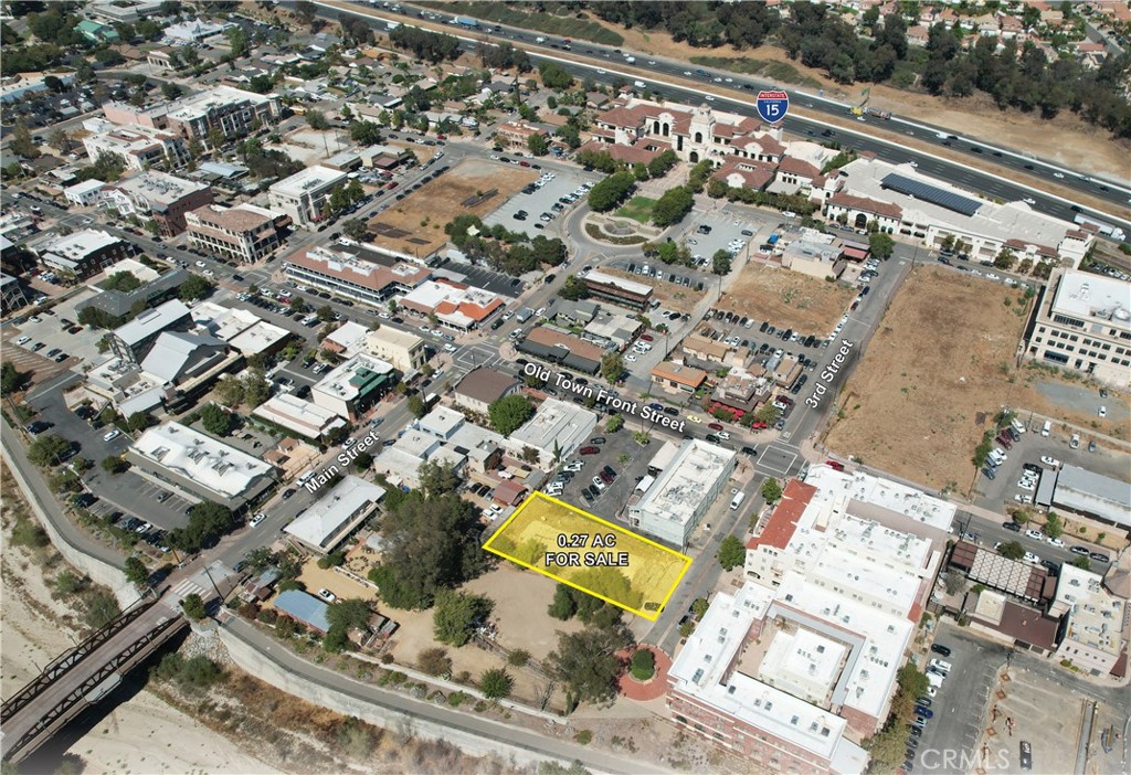 The offering consists of one legal parcel totaling approximately 0.27 acres (+/- 11,761 square feet) of land located on 3rd Street, just west of its intersection with Old Town Front Street in the heart of Old Town Temecula. The property sits adjacent to the Old Town Pub and is across the street
from The Warehouse at Creekside and Front Street Plaza. Additionally, it's located in the Old Town Specific Plan (SP-5) within the Downtown Core designated area. This district is intended to provide uses that support pedestrian oriented and mixed-use developments that accommodate a variety of land use focused on service oriented businesses. The height allowance is four stories and residential development between 40-70 DU/AC is also permitted with certain restrictions. The specific plan allows for favorable development standards and parking requirements (if any) are determined by the proposed land use.