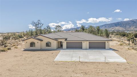 Photo of 1483 Smoke Tree Road, Pinon Hills, CA 92372 (MLS # IV25071946)