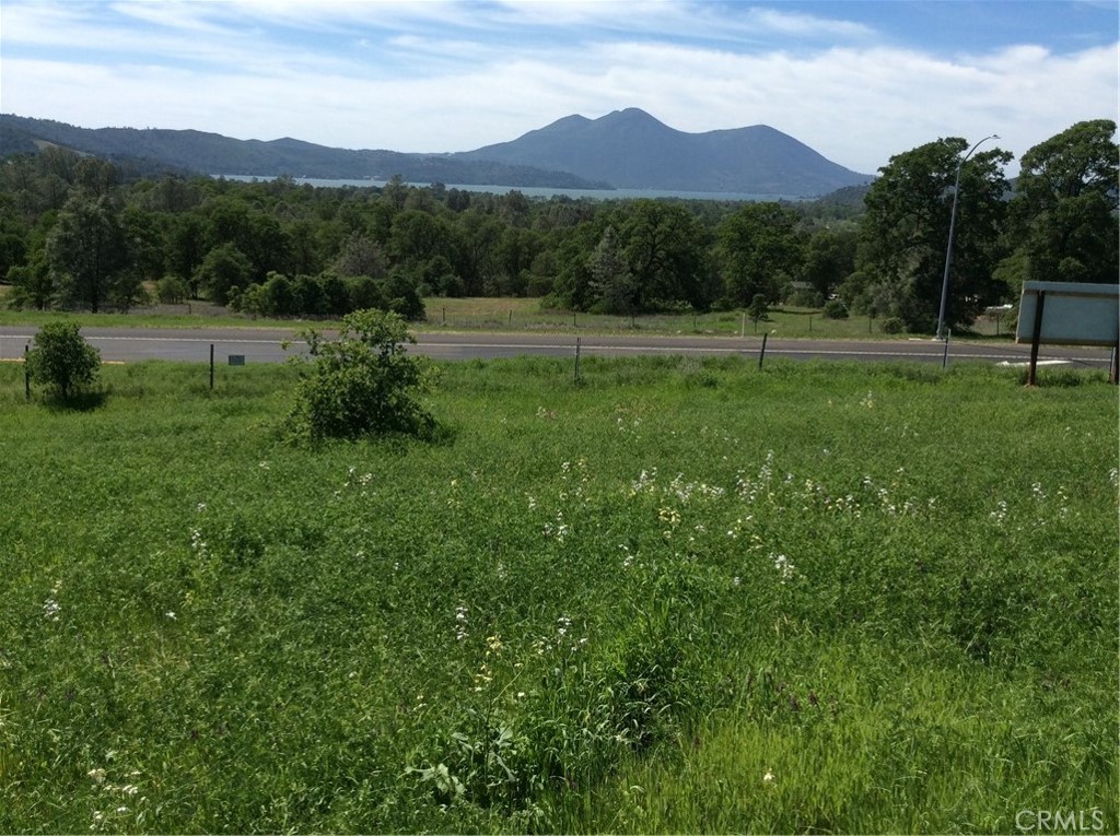 This commercial property runs parallel with Highway 53 and is an ideal location for a car dealership, boat sales or any other possible business venture that would benefit from a high visability location. Consists of two parcels 010-053-36 and 039-401-33 which equals 1.38 acres total. SELLER FINANCING IS AVAILABLE