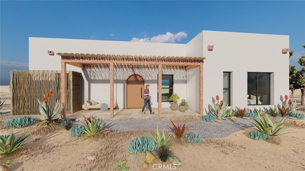 Perched on nearly two acres in a prime area of Yucca Valley, this property offers a rare opportunity to bring your desert retreat to life. With approved plans and permits in place including: Arborist report, Environmental/soils report, Energy report, Structural calculations, Approved architectural plans, Loan-approved construction estimate and contractor, Approved construction permit, andHi-Desert Water will-serve letter, you can break ground on a thoughtfully designed 1,200-square-foot, two-bedroom, two-bath home featuring an open floor plan and a spacious living and entertainment area. The highlight? A stunning rooftop deck perfect for stargazing under some of the darkest skies in California.
Surrounded by native Joshua Trees and panoramic mountain views, this location provides the perfect balance of seclusion and accessibility. Just 20 minutes from the legendary live music scene at Pappy & Harriet’s in Pioneertown and the endless outdoor adventures of Joshua Tree National Park, you’ll have no shortage of ways to fill your days. Explore the nearby Black Rock Canyon trails, browse the eclectic shops and galleries of Old Town Yucca Valley, or catch a performance at the Joshua Tree Music Festival.
With key reports and approvals—including structural calculations, septic and percolation reports, an energy assessment, and a Hi-Desert Water District Will Serve Letter—this property is ready for you to start building. Create your own escape in one of the most sought-after areas of the high desert.