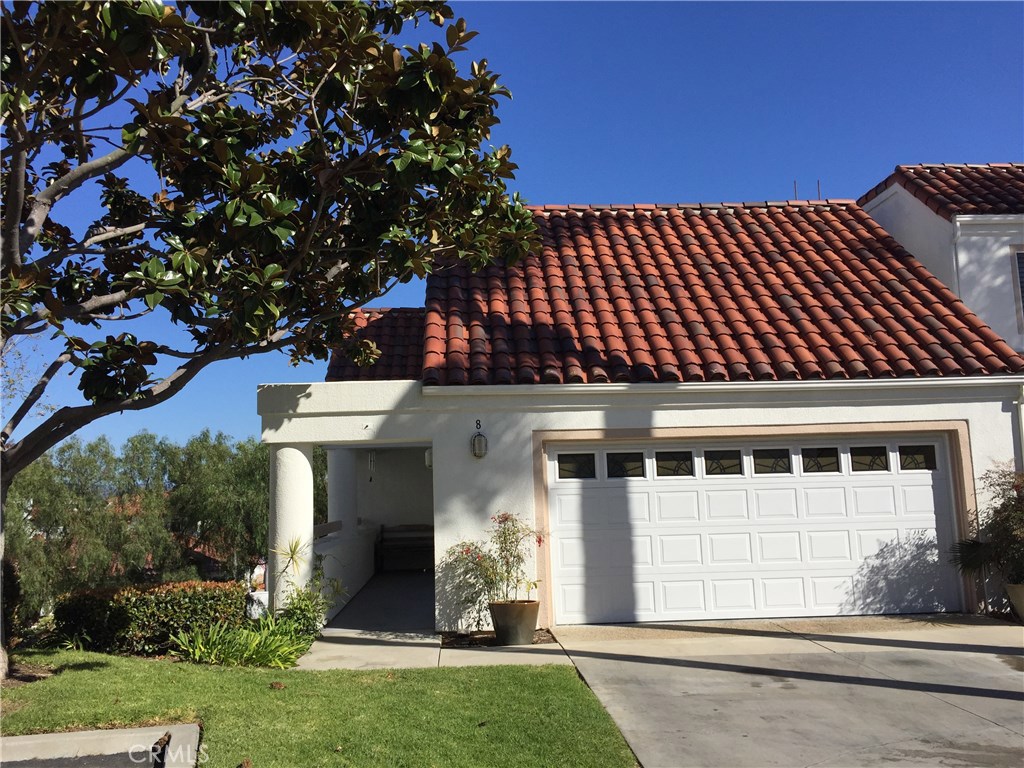 PRICE REDUCED!! ON THIS 3 BEDROOM TOWNHOME IN GATED ENCANTAMAR. END UNIT WITH SOARING CEILINGS, OPEN FLOOR PLAN, FIREPLACE, LARGE MASTER SUITE WITH WALK IN CLOSET, SEPARATE LAUNDRY ROOM. COMMUNITY CLUBHOUSE AND POOL. ACROSS THE STREET FROM SHOPPING, RESTAURANTS AND MOVIES. CLOSE TO BEACH AND WALKING TRAILS. NOTE: THE NAME OF THE STREET IS LOGO VISTA