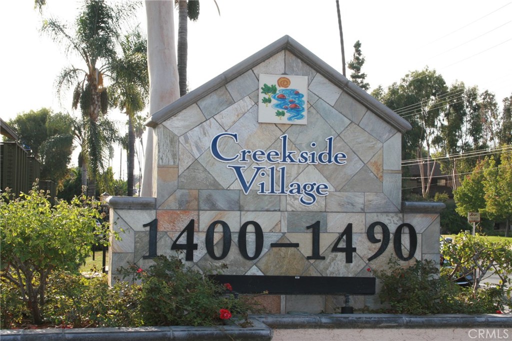 New Listing in the Peaceful Gated Condominium community of Creekside Village in La Habra - this ground level unit overlooks tranquil mature trees and gardens. This is a 1 Bedroom Unit with 1 Full Bath that has been freshly painted, it has new carpets, granite countertops throughout, a large walkin closet and central air conditioning. The Condo has an open floor plan, community pools, small park areas, and outdoor community barbeque's. The home is move in ready and will not last long.