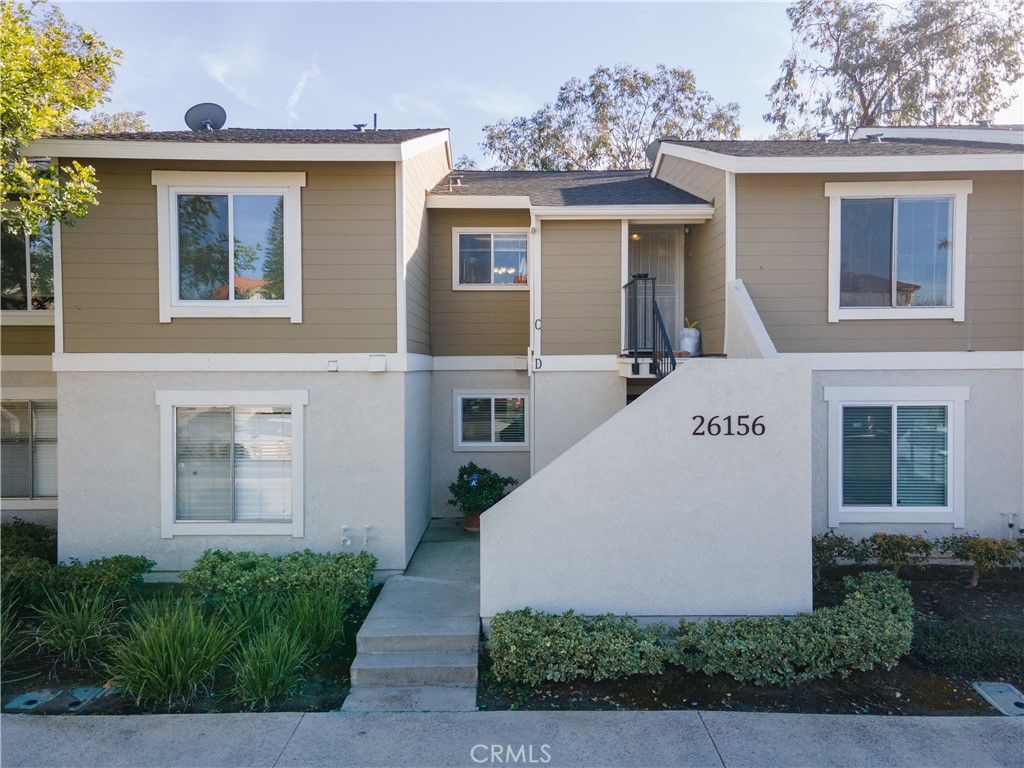Welcome to this beautiful condo community in Mission Viejo. This home has been highly upgraded from the engineered luxury vinyl flooring to the amazing outdoor space. When you enter the home you are greeted with natural light throughout and can see all the way into your private backyard. There are no neighbors behind you which makes this condo very special and relaxing. The kitchen has upgraded white cabinets with white counters and stainless steel appliances. The full bathroom has tasteful tile plus a full shower and bathtub. Both bedrooms have great space and nice size closets. The backyard has all new turf and fruit trees which makes it an incredible space to entertain and relax. This home will not last!