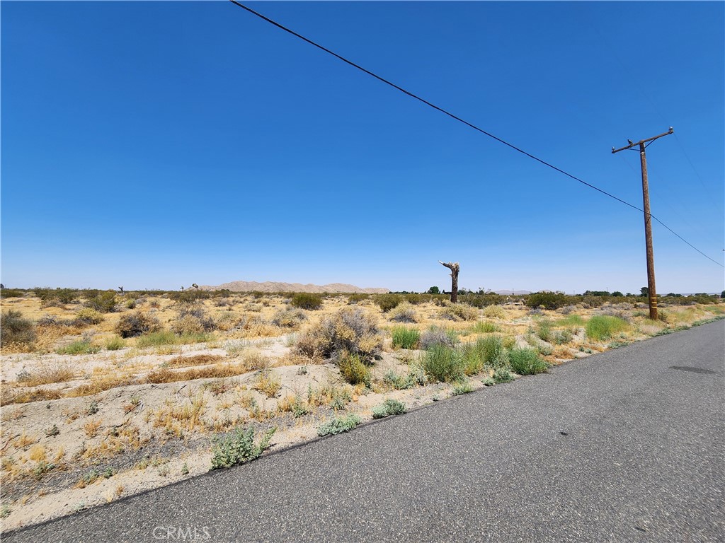 Welcome to El Mirage!!! This parcel sits right off El Mirage main road and its also on a paved street. Sale includes the parcel west of this lot, making it a total of 4.45 Acres. Don't miss on this one!!!