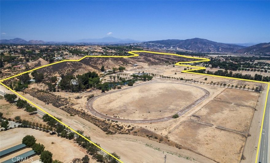 The CBC Land Team has been exclusively selected to represent the sale of Westfield Ranch, a +/- 235.5-acre residential development opportunity located at the southern entrance of Temecula Valley wine country.  The property is mostly flat and developable with the opportunity to cluster homes along Anza and De Portola and leaving the hillside area for larger estate lots or open space.  The current improvements include several structures including a main house, guest house, private lake, stable, and horse track.  The property has the the potential to be rezoned to allow for a more dense residential project, likely 1-acre lots, with a mixed use component that could include wineries, horse stables, hospitality, etc.  Please reach out to a member of our team with any questions.