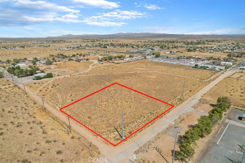 This versatile parcel is zoned Mixed-Use, allowing for a wide range of development possibilities: from high-density multi-family housing, commercial retail, and dining venues to medical offices, entertainment centers, senior care facilities, industrial warehouses, and more. The choice is yours!
Strategically situated just a few miles between the two future Brightline high-speed rail stations in Victor Valley, this property is poised to benefit from the upcoming connection between Las Vegas and Southern California. Located less than 3 miles from Southern California Logistics Airport and just 0.4 miles from Adelanto City Hall, this parcel offers unparalleled convenience and accessibility.
With Adelanto’s motto, “The City with Unlimited Possibilities,” this land embodies that vision. Don’t miss your chance to capitalize on the area’s growth and develop your next successful project in this dynamic region.