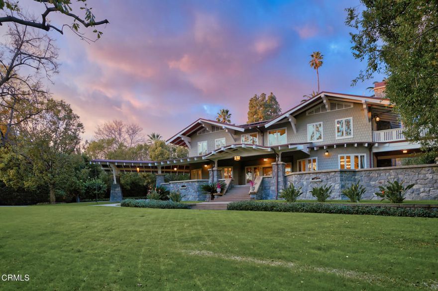 This gracious shingled estate, known as Sierra Bonita Ranch - Yerxa House, is situated on a gated and lushly landscaped .92 acre lot and was completely reconstructed in recent years from exterior walls to interior studs while retaining its original exterior design. As a Designated Historical Landmark and under the Mills Act, thus enjoying substantially reduced property taxes, the nearly 6800 square foot home offers mountain and valley views, expansive public rooms, and wide terraces for large-scale entertaining.   No detail was overlooked in the years' long reconstruction of the home and grounds with meticulous attention to detail and superior craftsmanship, including elegant finishes with box beams and crown mouldings, sophisticated lighting throughout, and new electrical, plumbing, whole house water filtration, water softener, fire sprinkler and solar systems, built-in window screens, seismic retrofitting, exterior walls, shingles, roof, and terrace.  Special interior features include fireplaces in the Living and Dining Rooms as well as the Primary Bedroom suite, multiple French doors opening to terraces and decks, a Lacanche stove, two Miele dishwashers and wine refrigeration in the Kitchen, an office, theater and sun rooms, and a magnificent second floor Library-Family Room. Exterior features include pool, spa, new landscaping, lighting, and stonework, a porte-cochere, and sweeping front and rear lawns. This is an exceptional estate offering of a truly 'newer old house' in the heart of one of the San Gabriel Valley's most beloved village communities