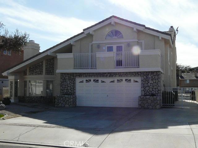 MAGNIFICENT LAKE FRONT HOME. This Gorgeous 4 bedroom/3 bath home has been IMMACULATELY maintained and is MOVE IN READY. This SUPERB home is located on a water front lot (on finger) in Spring Valley Lake. Interior features include: 2 Master bedrooms (1 up/1 down). 1st floor- Spacious Gourmet Kitchen w/granite counter tops/tile back splash, huge island w/5 burner stove top, built in ice maker, sizable breakfast bar and walk in pantry. Open family room w/stunning rock fireplace w/insert, decorative shelving, ceiling fan/french doors that open to the covered patio that overlooks boat dock/lake. Formal living room/dining room has elegant fireplace w/wooden mantle/trim, plantation shutters and crown molding. Large Master Bedroom has laminate flooring, ceiling fan and large roomy closet. Master bath has dual sink, beautiful tiled counter top/flooring. Spa room overlooking patio/lake *2nd floor- Spacious Master Suite has sitting area w/cozy corner fireplace, step up area for sleeping, french door that open to large balcony that over looks the lake. HUGE Master Bath has a beautiful glass w/tile walk in steam shower, jetted bathtub, dual sink and large walk in closet. 2 additional full sized guest bedrooms each w/ceiling fans and laminate flooring both close to hall bath. Media/Game room has built in wet bar, decorative shelving, ceiling fan and french doors that lead to over sized balcony. TOO MUCH TO LIST. A MUST SEE. All info deemed reliable but not guaranteed. Buyer to verify all. Association Amenities: Beach, Marina # of RV Spaces: 0 Special Features: BN,CC,VA,,PTRY,WSEC,SK,WBOSM,LAKE,BEAC,MARN Lot Location Type: On Lake Landscaping: Sprinklers Patio and Porch Features: Balcony Special Features: Garage Door Opener # of Attached Spaces: 2 # of Detached Spaces: 0