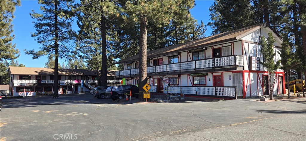 Priced to sell!!! Lets get this sold. 33 units - Prime commercial property right in the center of town. Property consists of two APN numbers with two addresses. Tenants are long term. The roof is only 3-4 years old and seller just completed a nice picnic area on the corner property. 42001 Big Bear Blvd is a 2 story building and consists of 8 units and 19 storage units, as well as parking for snow plowing equipment, and picnic area. The 8 units all have own heating and air units. 42011 Big Bear Blvd is also a two story building and has a restaurant that occupies the entire bottom floor with 5 units on the top floor. Property has a huge parking lot for at least 40 cars. Combined properties share the marquee sign, right on the Boulevard. Property is priced to sell.............
