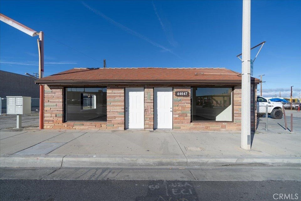 Introducing a fully renovated commercial property nestled within the bustling Lancaster Transit-Oriented Development (TOD) Zone, offering an exceptional opportunity for savvy investors and business owners alike. Boasting two distinct units, each equipped with individual electrical and gas meters, this property spans an impressive 15,000 square foot lot inclusive of a fenced and gated storage space--an invaluable asset for various industrial, commercial retail, or office endeavors. Elegance meets functionality with recent enhancements, including fresh interior and exterior paint, as well as the installation of new plank flooring throughout both units. Modernized bathrooms feature sleek vanities, toilets, and countertops, elevating aesthetic and functionality of the space. Strategically positioned to capitalize on high visibility and abundant street traffic, this property presents an ideal setting for establishing or expanding your business ventures. With the flexibility to occupy one unit while leasing out the other, potential for supplementary income is within reach. Convenience reigns supreme with ample parking on each side of the building, ensuring effortless access to both units. Weather you're an entrepreneur seeking prime location or an investor seeking a lucrative addition to your portfolio, this property represents a truly remarkable opportunity in the heart of Lancaster's thriving commercial landscape. Don't miss your chance to make your mark--schedule a viewing today!