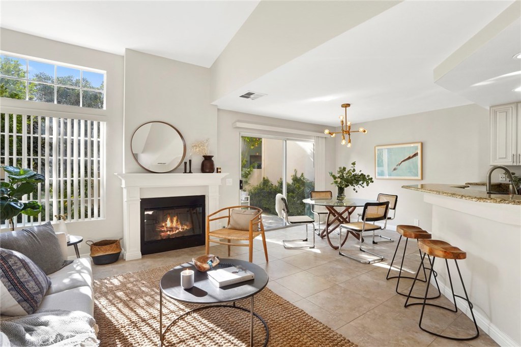 Don't miss this rare opportunity to secure a turnkey central Irvine condo priced under $700k. Perfect for a first time home buyer or investor alike. This wonderfully appointed home, located in the community of Westpark Las Palmas, features three large bedrooms, two and one-half bathrooms, an open & airy downstairs layout, and tranquil back patio. The Del Sol floor plan encompasses 1,407 square feet and boasts vaulted ceilings, fresh interior paint, recently updated carpet, upgraded cabinetry & countertops, and recessed lighting. Community amenities include a pool, spa, barbeque grills, and multiple parks. Ideally located within walking distance to premium restaurants, shopping, and a short drive to UCI, top rated golf courses, several corporate headquarters, the 405 freeway, and John Wayne Airport.