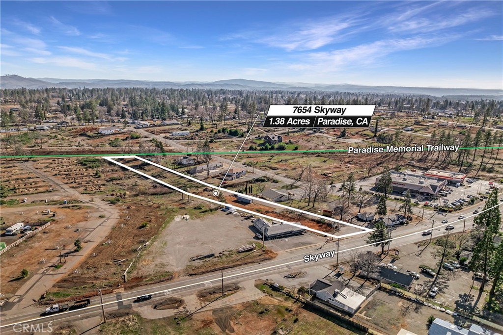 Prime Commercial Opportunity on Skyway! 7654 Skyway is a spacious commercial property on a 1.38-acre lot (60,113 sq. ft.). Located on a high-visibility corridor, this ready-to-build site offers ample space for your next business venture. PID water service is active and paid. See supplements to view current civil survey. Don't miss this opportunity to establish your presence in a growing community!