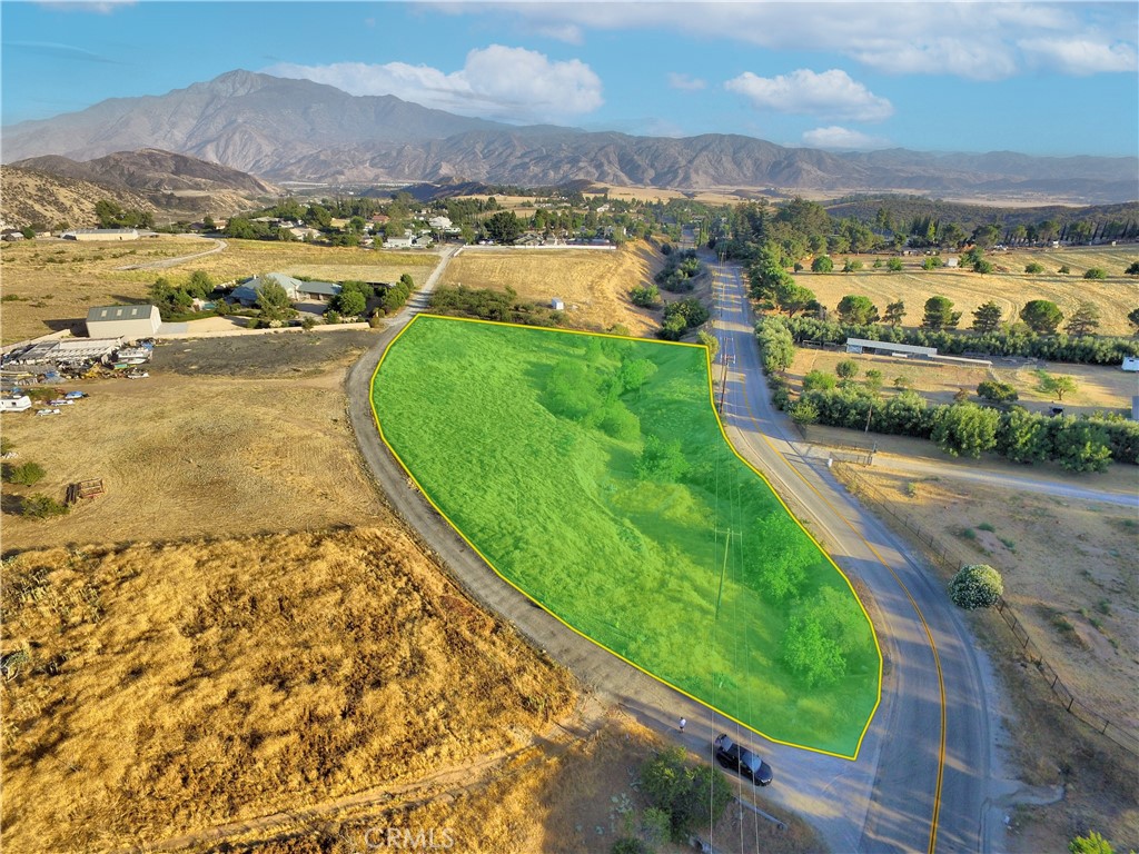 Your dream lot awaits! This corner parcel is just over 2 acres and comes with a well already on site (approx. 420' deep). Gorgeous views of the mountains to the North and the valley to the South. Tucked up and away on the Banning Bench for ultimate privacy, yet close to freeways, shopping centers, schools, and more...dream location at an unbelievable price!