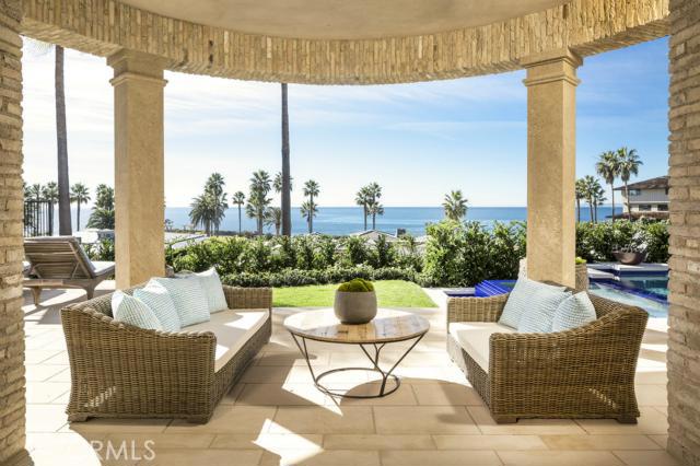 Situated on a private parcel at one of the world's most prestigious resorts, this newly constructed custom estate heightens every experience making life truly extraordinary. Spanning Pacific Ocean & Catalina Island views set the backdrop for every luxe detail in this 8,300+ square foot masterpiece, which was expertly designed by architect Chris Light to take full advantage of the residence’s close coastal proximity. A glass bridge invites you to this meticulously considered floor plan boasting a Great Room, formal dining room & master suite on the upper living level. Traversing to the lower level reveals grand living spaces encompassing a state-of-the-art game room, full theater room, stately library, wine cellar and tasting room & exercise room. This elevator-serviced residence is defined by zero-transition indoor & outdoor living spaces that surround the property, enticing you to indulge in the loggia, patio or courtyard as you take in color-soaked sunsets over the coast. The perfectly manicured exterior offers luscious landscaping and tranquil fountains to create the ultimate in grand-scale entertaining. This resort-style estate offers coveted access to all luxurious amenities of the resort including personal concierge services, spa & private dining.