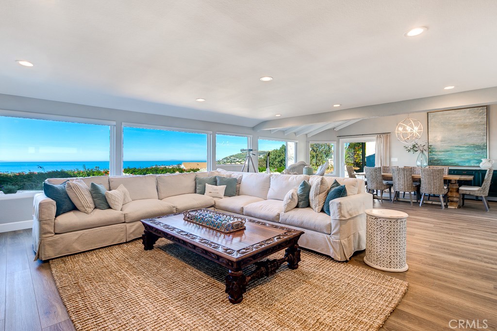 California sunsets surround you in this stunning single level ocean view home. This newly remodeled home is located in the private, gated community of Niguel Shores. The home is fully furnished with 3 bedrooms, office, and yoga room. From the moment you walk through the front door you will be captivated by the ocean views from almost every room. New wood like floors throughout, new kitchen and baths with quartz counter tops, and new appliances. Includes AC, utilities, cable, and WIFI. BBQ and out door dinning on the private courtyard. Views of Catalina Island, sunsets and palm trees will dazzle you daily. In this beach side community you will find a jr Olympic size pool, spa, tennis courts, sports courts, playground, shuffleboard, private beach parking and access, and a private bluff park where neighbors become friends. Walk to the Ritz, the Waldorf, hike the trails, or hop in a shuttle to Laguna Beach or Dana Point. The home has been painted and has new hardscape front and back. The pictures are a mixture of before and after the hardscape.