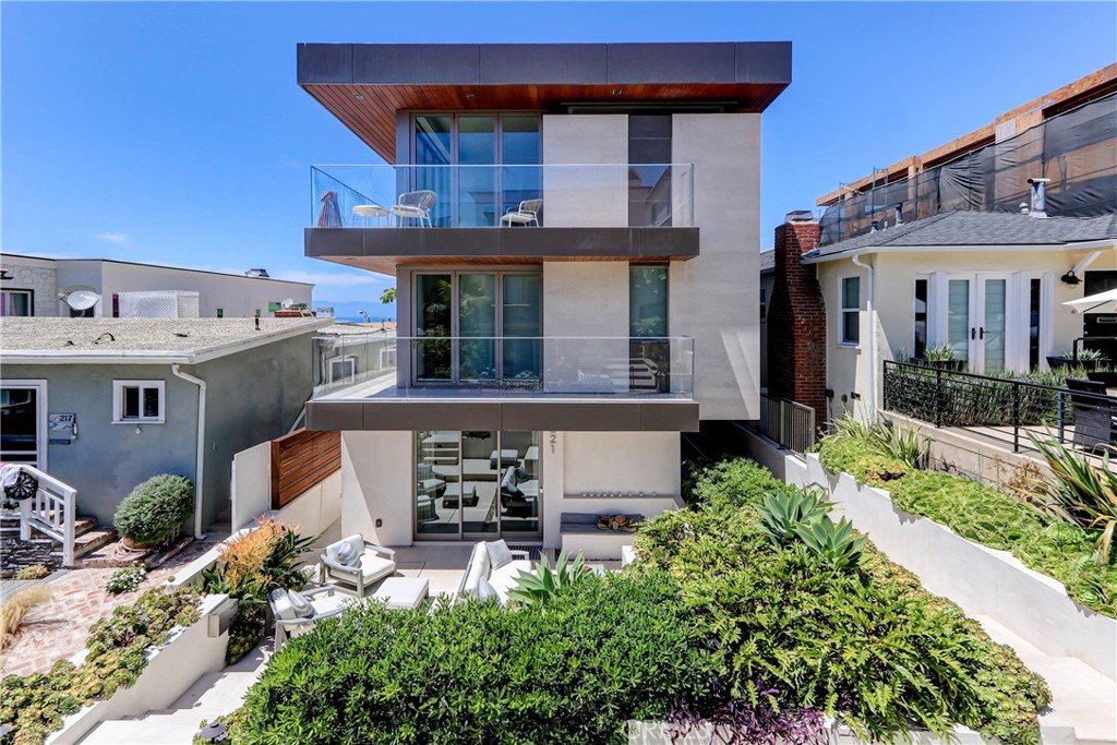 ***This property is sold with the input and description intended for Comp purposes****
This truly is one of a kind... With more than 5600sf of living space spanning 4 stories, this 6 bedrooms and 7 bath absolute masterpiece deserves to be considered as one of the finest homes built on the MB walk streets. This home has every element of an ultra high-end custom build. Each floor is connected via the custom floating staircase and full-sized elevator. The basement starts off with an in-home spa room with cypress and teak finishes and a 10' high light-filled living plant wall with water feature. This level also includes a 160" 4K Dolby 7.2 movie theater, 1,000+ bottle wine cellar with dual- humidity control and awesome lighted onyx fully loaded bar with all of the necessities. The walk street level has an amazing indoor/outdoor living vibe with limestone throughout. The large primary suite includes ocean views and a bathroom with a custom built bath from Neolith stone as well as a shower with steam shower. As expected, the top floor has some of the most incredible panoramic ocean views you will find in the city and beyond. The perfect ultra luxury kitchen has Gaggenau and Hestan kitchen and outdoor appliances along with all of the amenities of a home of this caliber. The interior is controlled by Crestron automated lighting and shades, 9 zones of AC with whole-house humidity control, Fleetwood doors and windows, European wide oak flooring, security cameras and alarm system and much more. The location is A+++ being on the preferred north-side of the walk street, just 1 block or so from the beach, and a quick walk to downtown. Pretty much perfect.