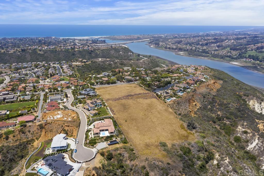 One of the last remaining large residential development sites in Encinitas. THIS IS THE "GEM". Amazing Ocean and Back Country views from this 10.1 Gross acres lot. This property has one of the highest elevations in Encinitas. Current zoning is R1, however it is possible using density bonus to get 15 lots (14 market rate and 1 affordable unit) OR 17 lots, (15 market rate & 2 affordable units). Existing frontage already has curb and sidewalk installed. Water and sewer are located in close proximity. Site is in the Olivenhain Water District and the Leucadia Waste Water District. Closest sewer manhole is right at the southwest corner of the site. This is truly an exceptional site offering outstanding views to both the east and west. Located near Encinitas Ranch Golf Course, La Costa Resort & Spa, great restaurants and shopping plus there is easy access to I-5.