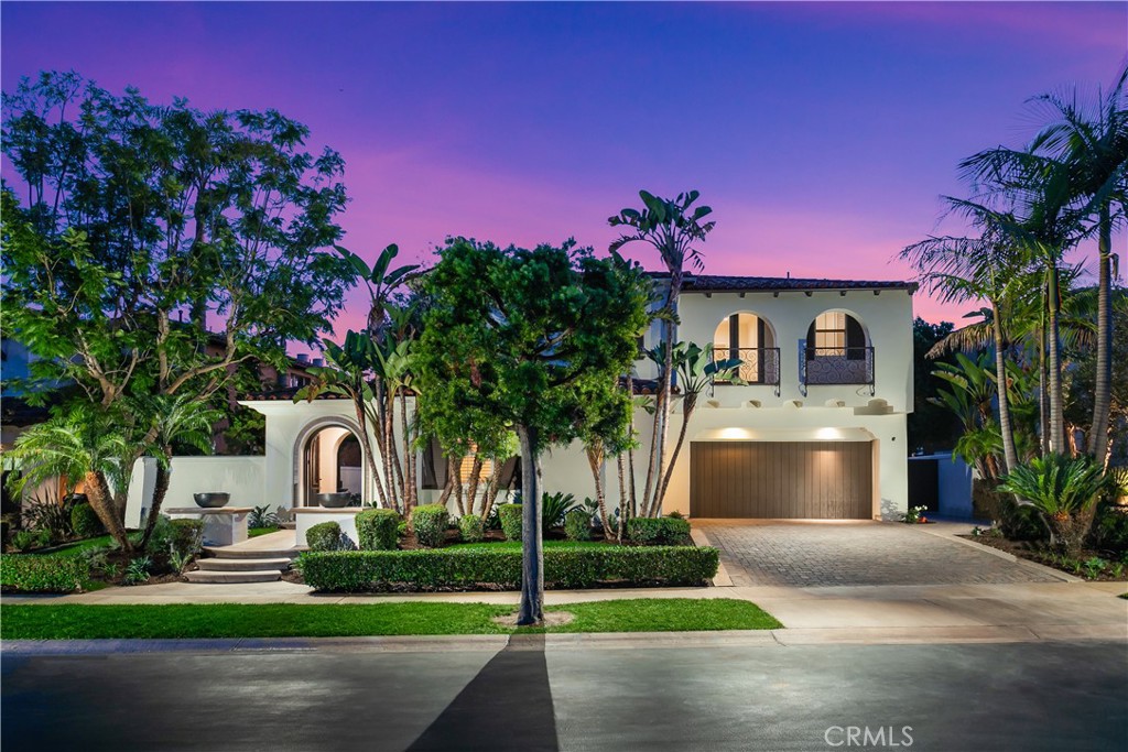 Boasting breathtaking coastline views and situated on the front row of the exclusive guard gated community of Coastal Canyon, 6 Dolomiti stands as a true example of a newly renovated trophy property exemplifying coastal living at its finest. Upon entry, guests are immediately greeted with soaring ceiling heights in the grand foyer that leads to the office and newly remodeled open concept floor-plan highlighted by newly installed bi-folding door systems allowing for seamless transitions between the formal living room, formal dining room, family room, and dream chefs kitchen. The ~4,500 sq foot newly updated home features 5 bedrooms + 5.5 baths + office + bonus room, and sit-down ocean views. The large glass pocketing door system offers an abundance of natural light in the family room and kitchen as well as the formal spaces creating a bright, open floor-plan and complimenting the indoor and outdoor living the home has to offer. The designer inspired renovation includes: Carrara marble countertops, custom-milled cabinetry, new Dacor & Miele chefs grade appliances, marble clad bathrooms, designer lighting, and beautiful new wood flooring throughout. A main floor guest suite provides an ideal retreat for guests and family, while the upstairs hosts three en-suite guest bedrooms, bonus room, and an elegantly appointed Ocean-view primary suite completed by a retreat, dual-sided fireplace, designer dream primary bath, and a large walk-in-closet. This turn-key residence is completed with a spacious backyard, fire pit, grassy area, lush landscaping, and a covered pergola and outdoor dining area to take in the beautiful ocean and hillside views. Immediate proximity to Fashion Island, South Coast Plaza, Crystal Cove, award winning schools, and world class beaches complete this dream home.