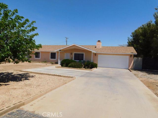 Very well taken care of Three Bedrooms and Two full baths in Northern Apple Valley. Block wall surrounds the entire property with a storage shed, fruit trees, large trees that provide shade and grass in the backyard. Large Wrought Iron on the south side of the house allows access to RV Parking in the backyard. Warm Fireplace in living room, two car attached garage with access to inside of home. Association Amenities: None # of RV Spaces: 0 Special Features: ,WSEC,SHNONE Lot Location Type: Standard Location Landscaping: Sprinklers Special Features: Cable TV # of Attached Spaces: 2 # of Detached Spaces: 0