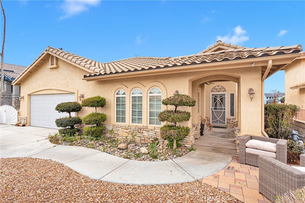 Beautiful upgraded home on the LAKE in Spring Valley Lake community. Walk into a beautiful 2,108 sq. ft. home featuring 3 beds and 2.5 baths, an open floor plan with high ceilings, new flooring and paint, spacious family room, dining room and living room with a beautiful fireplace, inside laundry room, upgraded kitchen with granite countertops and a breakfast nook with beautiful view to the lake, and upgraded baths with lighted mirrors. Spacious master bedroom with access to the backyard, upgraded master bath features double sink vanity, lighted mirror and a sauna. Spacious backyard with lake access, outdoor shower, RV parking and perfect for entertainment. MUST SEE TO APPRECIATE.