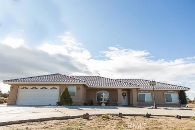 **AWESOME** 3b/2ba home in the highly coveted Oak Hills area with over 2 acres of land for all your toys and horses! Complete with RV parking and full hook-ups. This house is very clean and boasts an open floor plan, custom paint, newly painted exterior, surround sound in the living room, ducted evaporative cooler, great kitchen fit for a chef with granite counter tops, nice sized pantry, microwave/oven combo, breakfast nook and tile floors. The kitchen opens to the family room where you can enjoy the wood burning stove on a cold windy night. The wood burning stove sits on a granite hearth giving it extra appeal. The spilt floor plan offers privacy for the master suite which sits off the family room. It has a large closet with plenty of space and the master suite bathroom is ideal for relaxing with a sunken tub and double door entry. The master suite also offers its own entry to the covered patio and is insulated for warmth and sound proofing. Indoor laundry with a solar light right next to the master makes chores a breeze. Fully fenced with two large sheds perfect for your desert toys or extra decorations. Backyard also offers covered patio to enjoy those summer nights and a privacy block wall separating the rest of the yard. Close to Ranchero and the new Starbucks location making this ideal for those who commute. The neighborhood is quiet, growing, and only missing you, make this your home today! Association Amenities: None # of RV Spaces: 0 Special Features: ,PTRY,SHNONE Frontage Type: Dirt Road Lot Location Type: Standard Location Landscaping: Partial Special Features: Garage Door Opener # of Attached Spaces: 2 # of Detached Spaces: 0