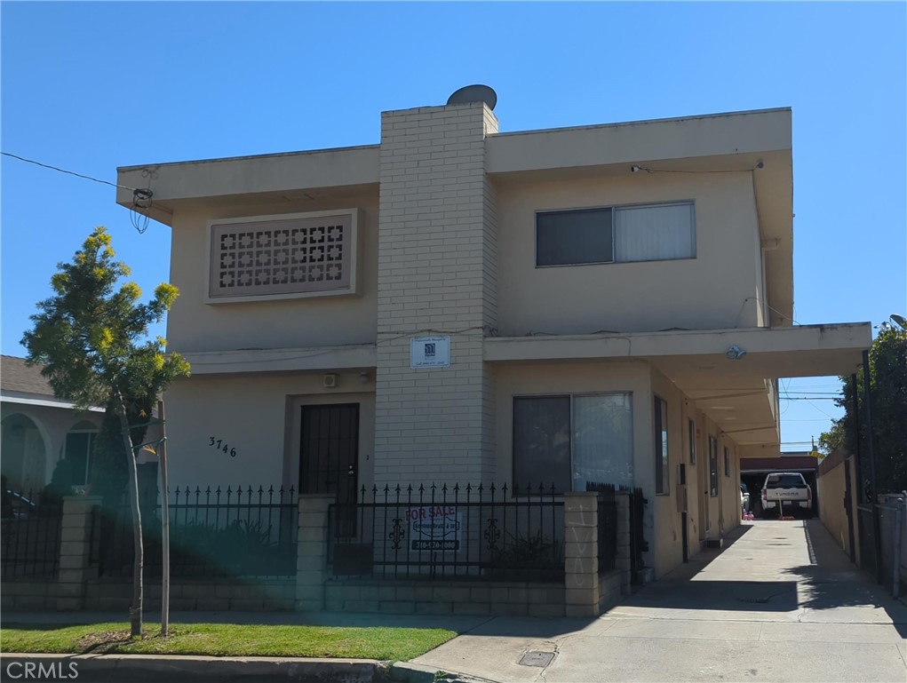 Prime investment opportunity! Large well maintained 4 unit building with a great unit mix. Front unit is a 3 bedroom 2 bathroom townhouse style, with family room, dedicated laundry room with hook ups, and working fireplace. Remaining units consist of (2) units with 2 bedrooms and 1 bathroom, and (1) 1 bedroom unit. Each unit comes with a rare extra large 2 car garage, which increases desirability for tenants and allows for slightly higher market rents. Fully occupied with long term low maintenance tenants, all at market rent. Front unit was upgraded with brand new windows this year.
