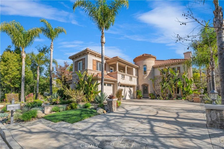 Nestled in the exclusive gated community of Bridgehaven… Being one of only thirty-six private residences with a low HOA, this stunning property offers a luxurious retreat in the heart of Westlake Village. Boasting a sprawling traditional lot enveloped by lush tropical landscaping, towering palms, and bountiful fruit trees, this residence epitomizes elegance and tranquility.
Property Highlights:
•Elegant Design: With five bedrooms, including a potential sixth, and 3.5 bathrooms, this home exudes timeless sophistication and modern comfort. The main floor bedroom, currently utilized as an office, seamlessly opens to the backyard oasis.
•Gourmet Kitchen: A chef's delight, the kitchen features an abundance of custom cabinets, a sizable center island, and a bright breakfast nook offering enchanting views of the meticulously landscaped yard, serene waterfall, and sparkling pool.
•Exquisite Living Spaces: The family room boasts a grand fireplace, bespoke built-ins, and expansive windows overlooking the picturesque pool, spa, and cascading waterfall. The formal living room and dining room exude opulence with high ceilings, abundant natural light, and captivating architectural details.
•Luxurious Retreat: The primary suite encompasses an office niche, a spacious sitting area, and access to a dramatic covered balcony boasting panoramic views towards Lake Sherwood and scenic hills, making it the perfect spot for relaxation and indulgence.
•Outdoor Paradise: The meticulously landscaped backyard features an elevated fire pit area above the cascading waterfall, pebble tech heated pool and spa, creating a captivating ambiance for outdoor gatherings. A gas BBQ grill, bar seating counter, and ambient lighting elevate the outdoor entertainment experience.
•Exclusive Community: Situated in a gated community reminiscent of a ''utopian'' haven, residents enjoy a serene, ''Mayberry''-esque lifestyle with convenient access to Lake Sherwood and Westlake Elementary via a charming greenbelt.