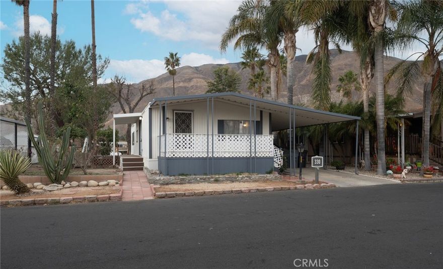Located in Country Lake, one of San Jacinto’s most sought-after 55+ communities, this beautifully updated home is ideally situated across from the clubhouse and pool area, offering convenient access to the community’s top amenities. This 3-bedroom, 2-bathroom home features new interior and exterior paint, updated electrical, and new recessed lighting. The remodeled kitchen boasts quartz countertops and brand-new cabinetry, providing a modern and functional space. The large lot includes several fruit trees, creating a peaceful outdoor retreat. Country Lake offers resort-style amenities, including a 4-acre lake with walking paths, two additional ponds, and breathtaking mountain views. Residents can enjoy a pool and spa, clubhouse with a commercial kitchen, horseshoes, shuffleboard, outdoor seating, laundry facilities, and RV storage/parking.