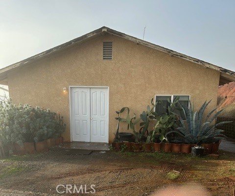 Little bit of country feeling! Nice view from top of the hill. 2.5 ACS 2 Bd-2 BA Soak in the claw foot tubs. Room for gardening with a 1500 gallon holding tank. Home has solar panels, batteries for panels are approximately 3 years old.