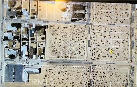 Photo of 0 Hollyhock 72, Adelanto, CA 92301 (MLS # HD24244643)